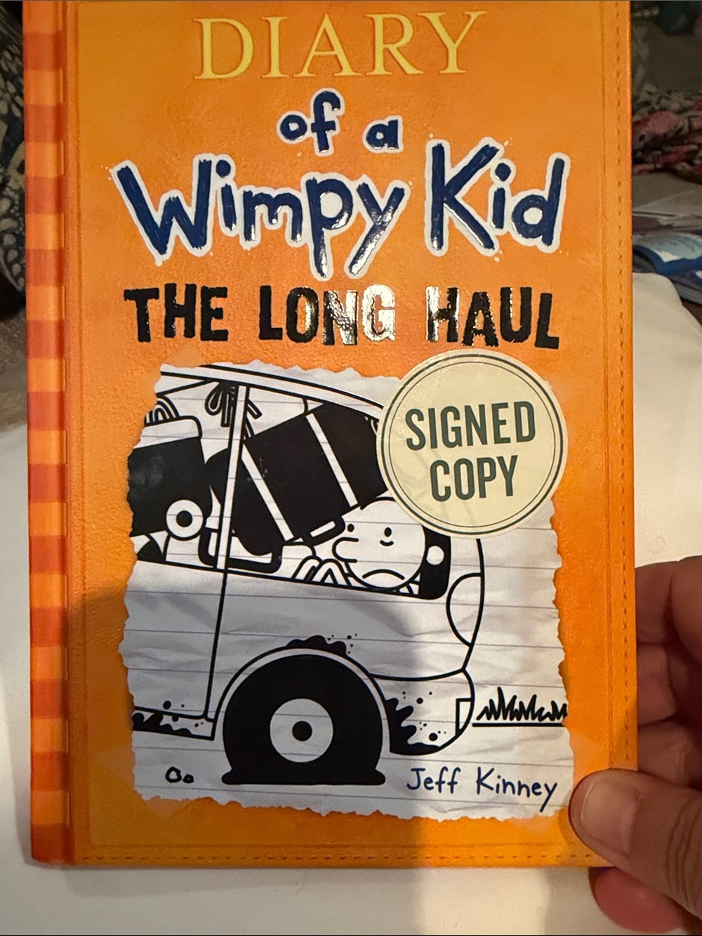 Diary of a Wimpy Kid: The Long Haul - Orange Signed Copy